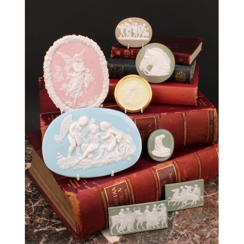 415 - A collection of jasperware cameo plaques, various Grand Tour and historical subjects, the largest 16... 