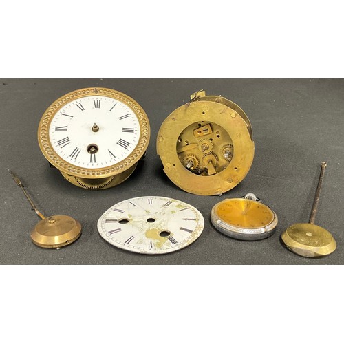 499 - A French La Fontaine clock movement; another, no maker; two pendulums; a Vivax pocket watch (5)