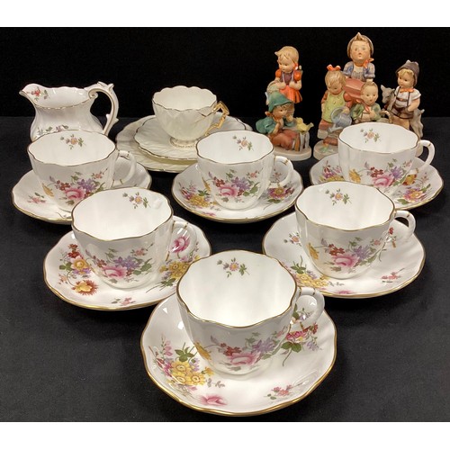 33 - Six Royal Crown Derby ‘Derby Posie’ tea cups and saucers conforming milk jug; a group of six Hummel ... 