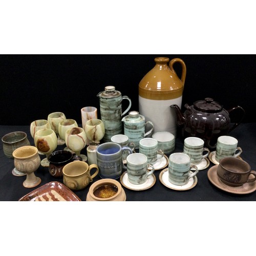 57 - Studio pottery including; coffee service in subdued green for six including; six coffee cans and sau... 