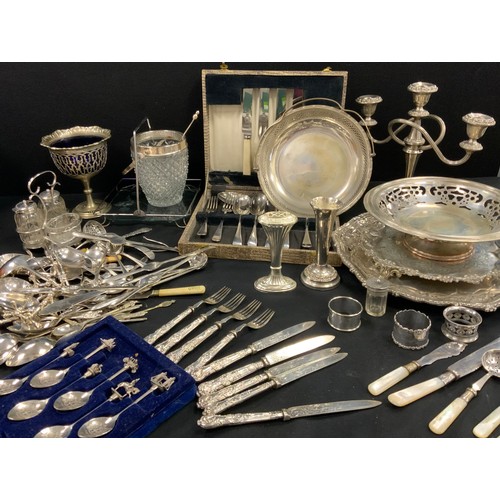 94 - Plated ware - candlabrum, silver napkin rings, silver handled knives and fork, flatware; etc