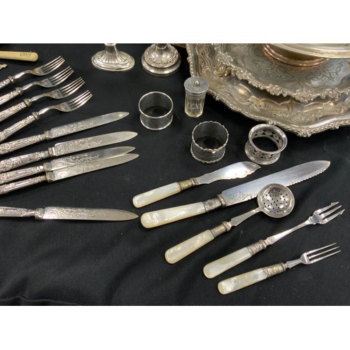 94 - Plated ware - candlabrum, silver napkin rings, silver handled knives and fork, flatware; etc