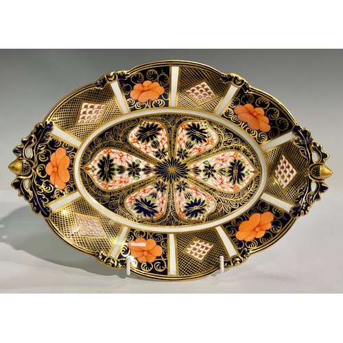 31 - A Royal Crown Derby 1128 pattern shaped oval dish, acorn handles and feet, 30cm wide, printed marks ... 