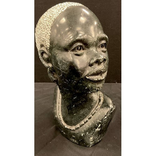 114 - A carved African stone Bust, as a Lady, 32cm high.