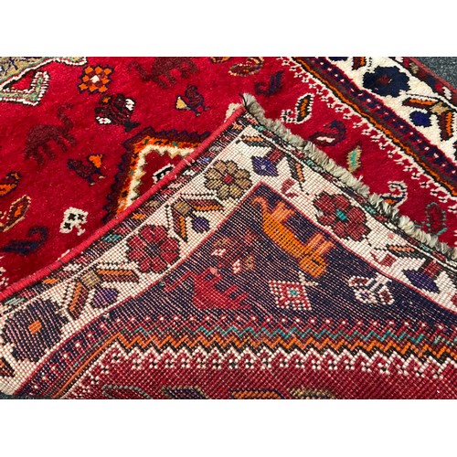 152 - A South-west Persian Qashgai runner carpet, hand-knotted in rich colours, with five medallions, with... 