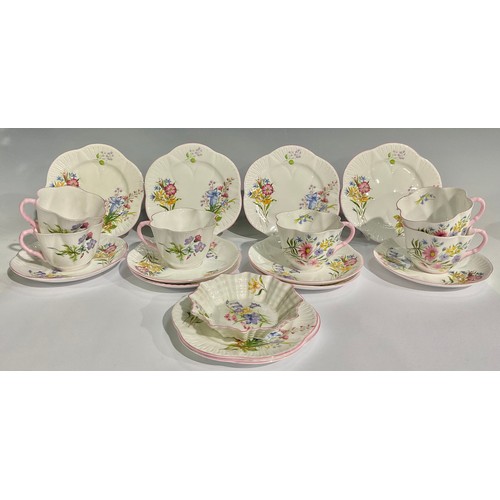 60 - A set of six Shelley Wild Flowers Empire shape tea cups, saucers and side plates; a similar trinket ... 