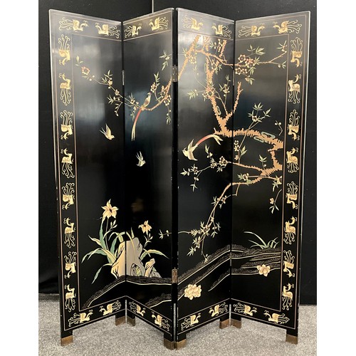 144 - A Japanese lacquered modesty screen, of four panels, decorated to both sides with Birds amongst bran... 