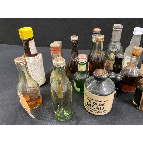 211 - Miniature spirits including; Angostura aromatic bitters, Glenfiddich scotch whiskey, Schnapps peach;... 