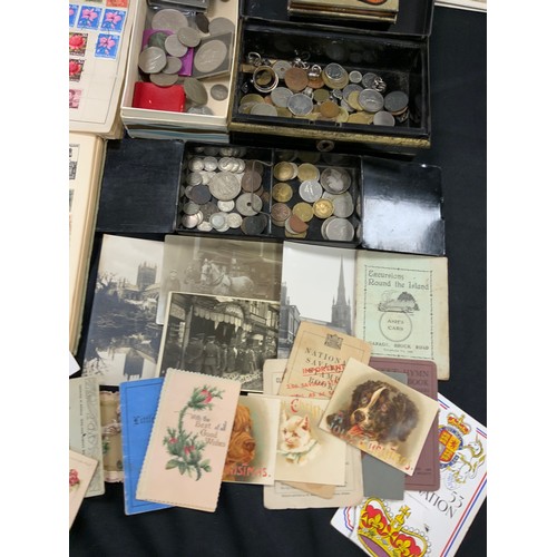 237 - A quantity of Stamps and Coins, postcards and newspapers; etc