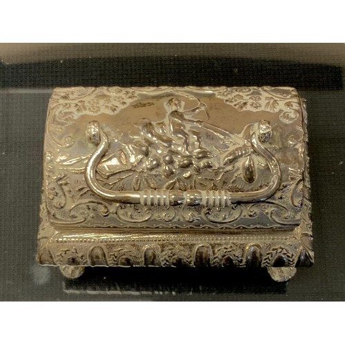 240 - An Edwardian silver dome top table casket, embossed Neptune riding a fish, floral scrolling border, ... 