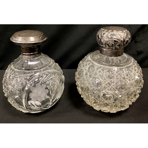 242 - A Victorian cut glass globular scent bottle, silver top, Birmingham 1898, another marks worn (2)