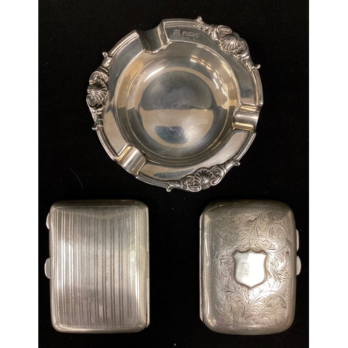 244 - A silver cigarette case, Birmingham 1921; another Chester 1922; Ashtray, Sheffield 1965, 5.7ozt (3)