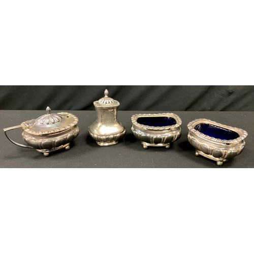 248 - An Edwardian silver three piece condiment set, pair of open salts and pepper, Thomas Levesley, Sheff... 