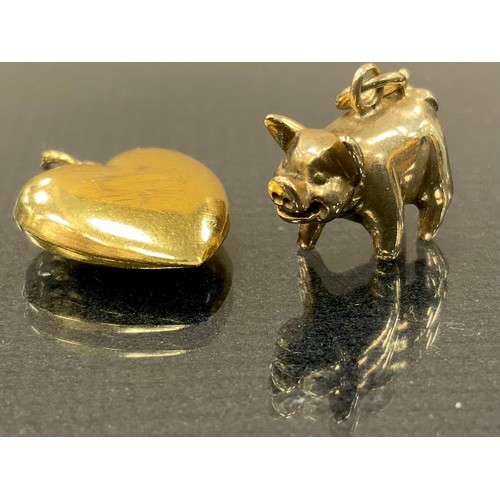 279 - A 9ct gold pig charm, another Heart, 4.5g