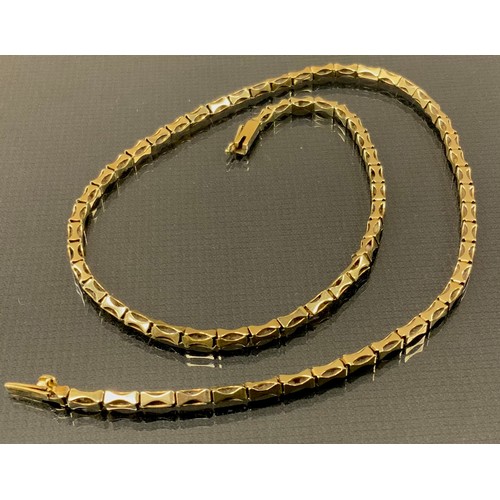 285 - A yellow metal fancy link necklace, stamped 14kt, 42cm long, 12.8g gross