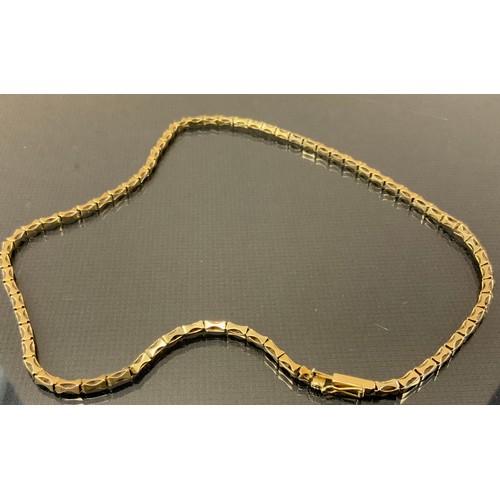 285 - A yellow metal fancy link necklace, stamped 14kt, 42cm long, 12.8g gross