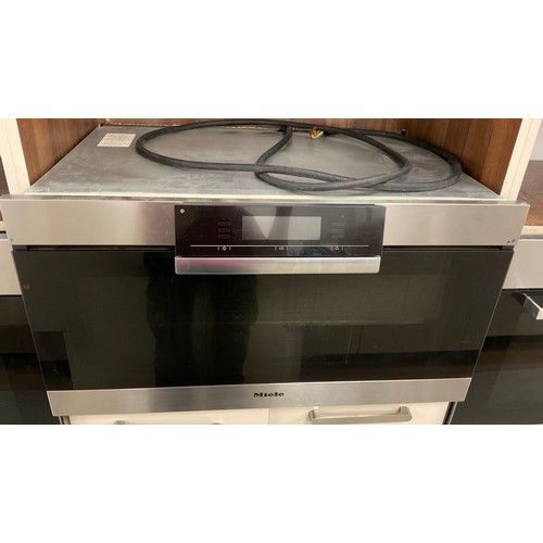 163 - Professional Kitchen Appliances and Equipment - A Miele Oven, model number H5981BP.