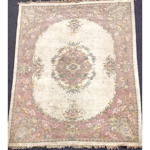 162A - A large Chinese woven wool rug,in tones of pink, cream and green, 284cm x 225cm; another 350cm x 251... 