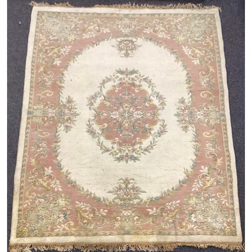 162A - A large Chinese woven wool rug,in tones of pink, cream and green, 284cm x 225cm; another 350cm x 251... 