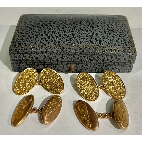 148 - A pair of 9ct gold cuff links, engraved with ivy, marked 375, 11g, boxed; another pair of 9ct gold c... 