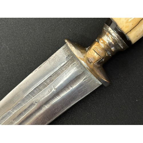 2057 - Indo-Persian Dagger with curved fullered blade 152mm in length. Brass guard with remains of plated f... 