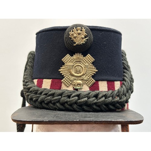 2068 - Edwardian Highland Light Infantry Other Ranks Shako. Complete with cap badge, cockade and cords. Lin... 