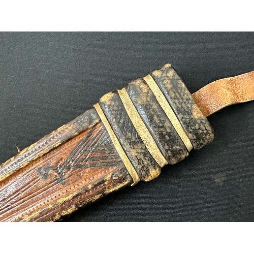 2074 - African Dagger with double edged blade 290 mm in length. Leather bound grip. Overall length 430 mm. ... 