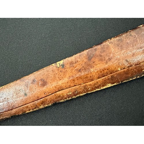 2074 - African Dagger with double edged blade 290 mm in length. Leather bound grip. Overall length 430 mm. ... 