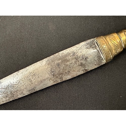 2075 - Dagger with double edged blade 260 mm in length. Blade decorated with punch mark patterns. Brass gri... 