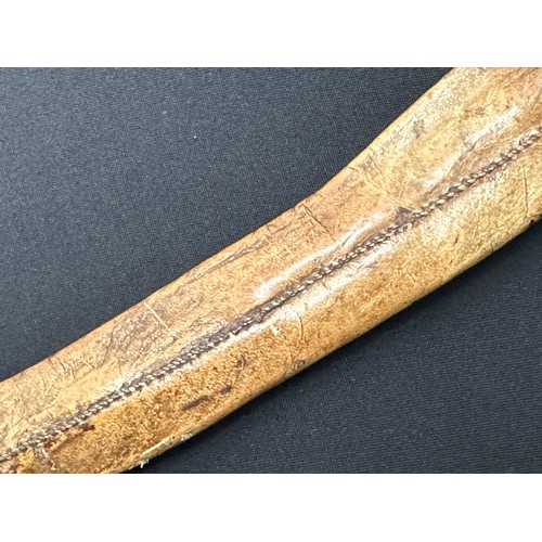 2076 - Dagger with curved double edged fullered blade 314mm in length. Decorative grip made from brass, cop... 