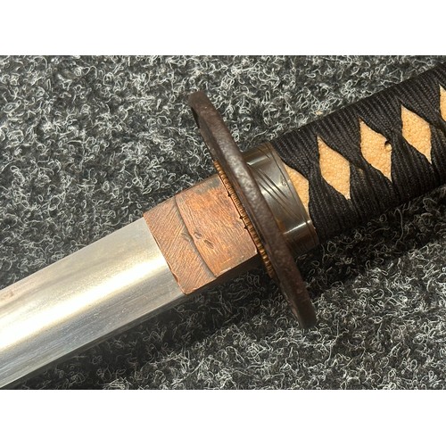 2093 - Japanese Katana Sword with single edged blade 640mm in length. Visible Hamon line. Tang is signed 