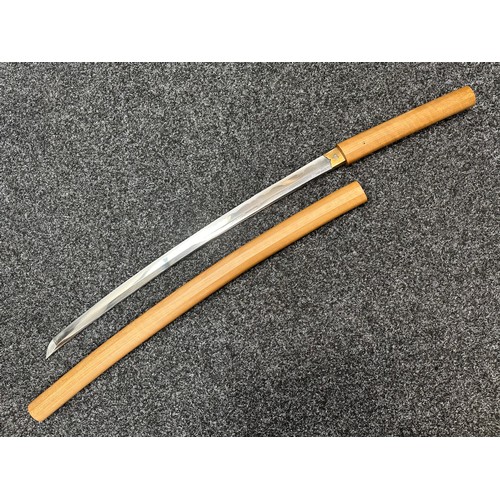 2094 - Japanese Katana Sword with single edge blade 650mm in length. Visible Hamon line. Tang is signed 