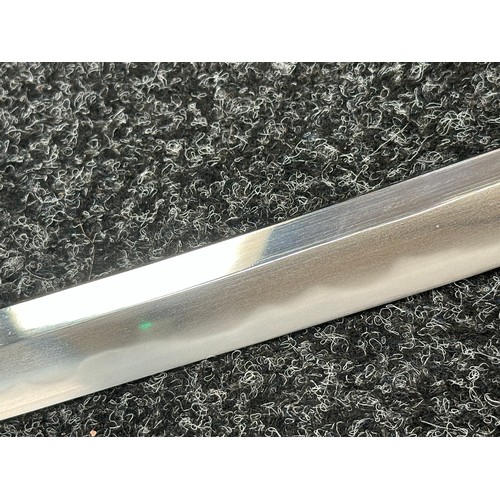 2094 - Japanese Katana Sword with single edge blade 650mm in length. Visible Hamon line. Tang is signed 