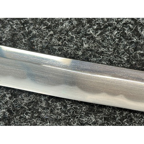 2094 - Japanese Katana Sword with single edge blade 650mm in length. Visible Hamon line. Tang is signed 