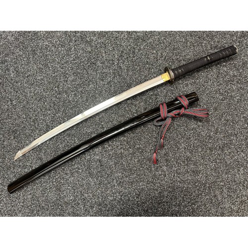 2095 - Japanese Katana Sword with single edged blade 680mm in length. Visible Hamon line. Tang is unsigned.... 