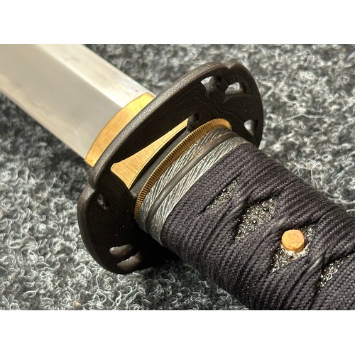 2095 - Japanese Katana Sword with single edged blade 680mm in length. Visible Hamon line. Tang is unsigned.... 