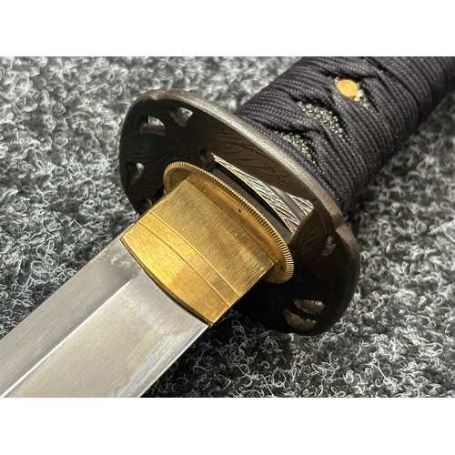 2095 - Japanese Katana Sword with single edged blade 680mm in length. Visible Hamon line. Tang is unsigned.... 