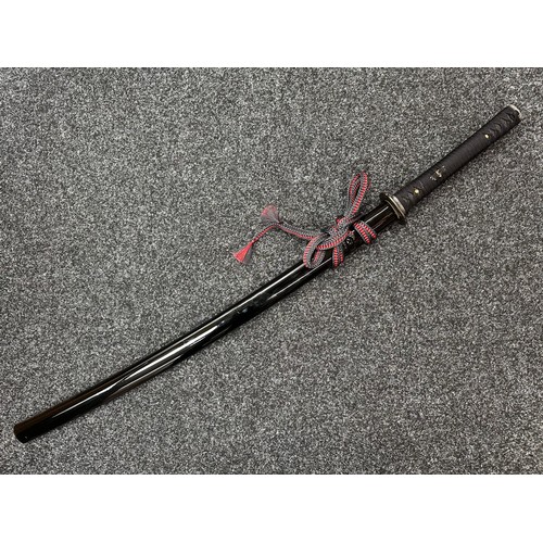 2095 - Japanese Katana Sword with single edged blade 680mm in length. Visible Hamon line. Tang is unsigned.... 