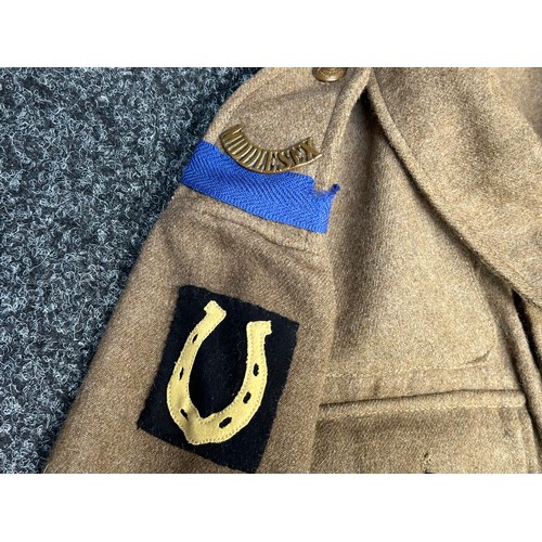 2105 - WW1 British Other Ranks Service Dress Jacket with Middlesex Regiment brass shoulder titles, Blue Com... 