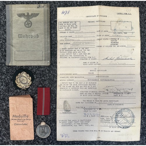 2158 - WW2 Third Reich Heer Wehrpass to Michael Baumann with complete with photograph. Awarded the Drivers ... 