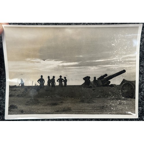 2169 - WW2 Third Reich Press Release photo of DAK Afrika Korps Heavy Artillery Position with an aircraft ov... 