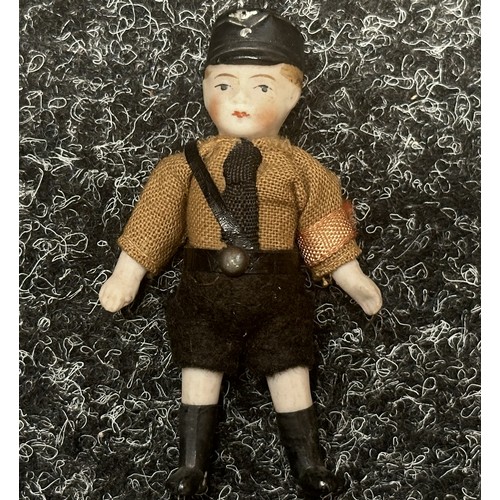 2184 - WW2 Third Reich Miniature Hitler Youth Doll. 8cm in height. Arms and legs will move. Porcellain cons... 