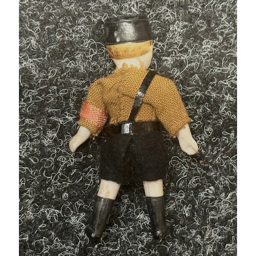 2184 - WW2 Third Reich Miniature Hitler Youth Doll. 8cm in height. Arms and legs will move. Porcellain cons... 