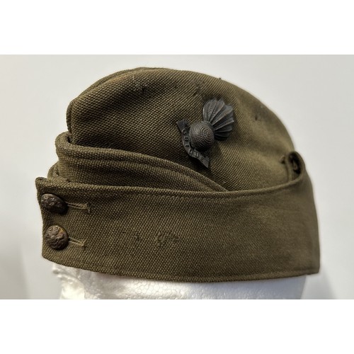 2205 - WW2 British Royal Artillery Officers Field Service Cap complete with officers bronze Flaming Grenade... 