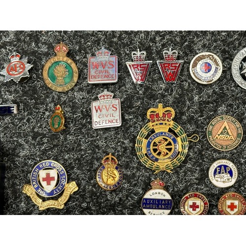 2272 - A collection of enamel lapel badges to include Royal British Legion, WVS Civil Defence, Womens Land ... 