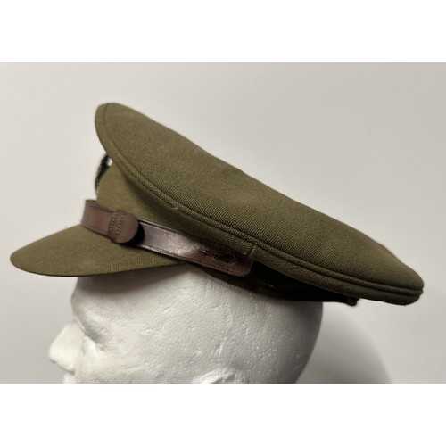 2292 - Post War British RASC Officers Service Dress Cap fitted with a dress uniform enamelled King Crown ca... 