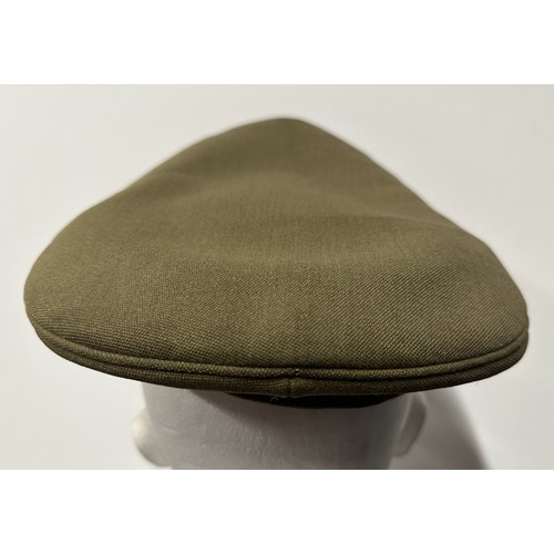 2292 - Post War British RASC Officers Service Dress Cap fitted with a dress uniform enamelled King Crown ca... 