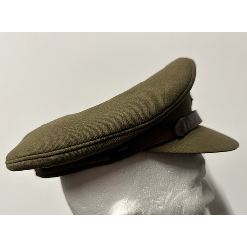 2292 - Post War British RASC Officers Service Dress Cap fitted with a dress uniform enamelled King Crown ca... 