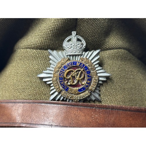 2292 - Post War British RASC Officers Service Dress Cap fitted with a dress uniform enamelled King Crown ca... 