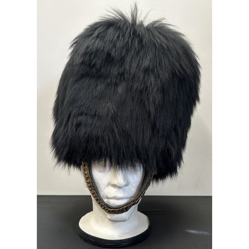 2295 - Guardsmans Bearskin Headress, no plume, wicker basket. Brass chinscales. No date or makers markings.